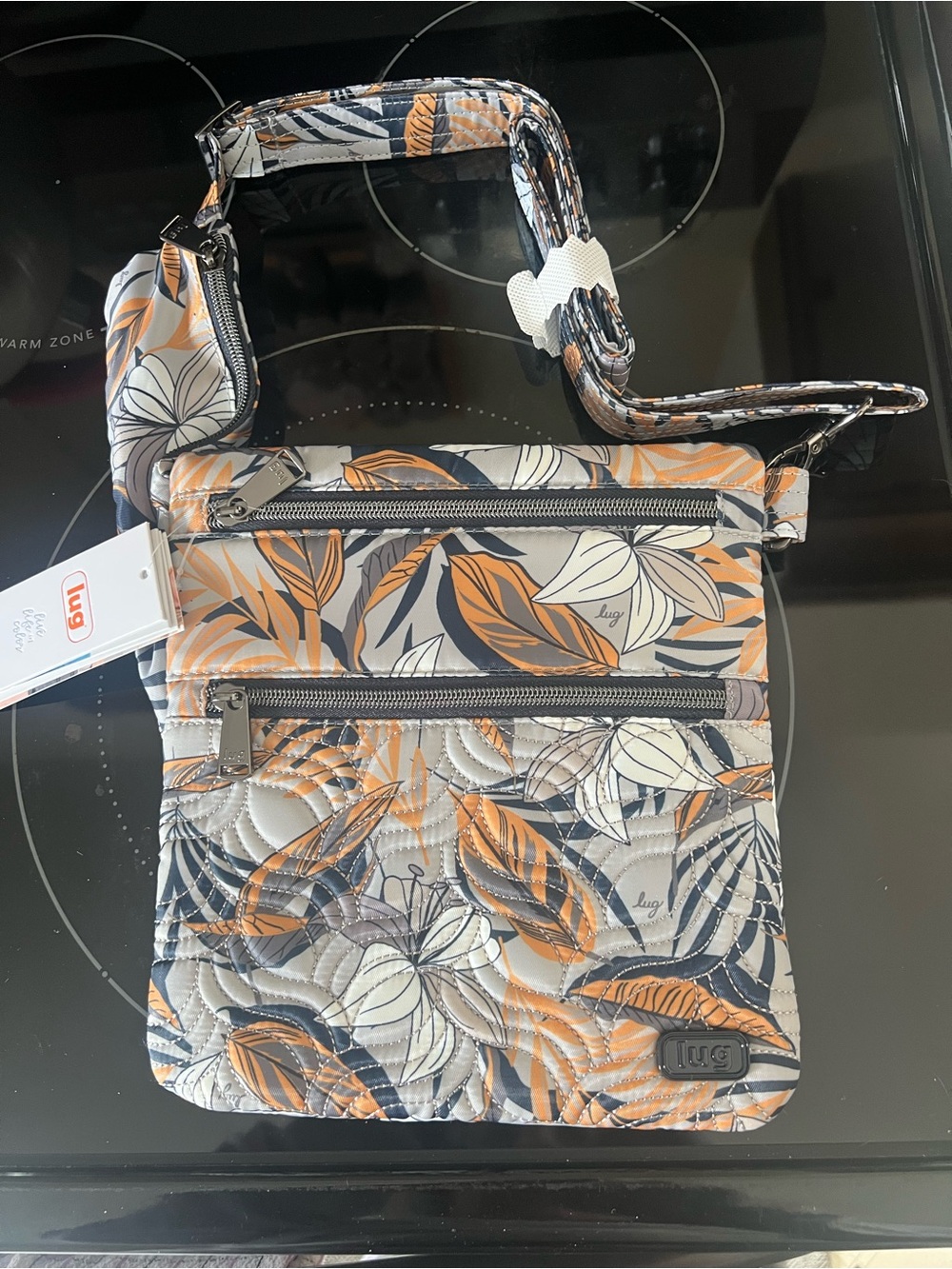 lug Quilted Crossbody Bag in Orange, Cream and Black Leaf Print. NWT.
